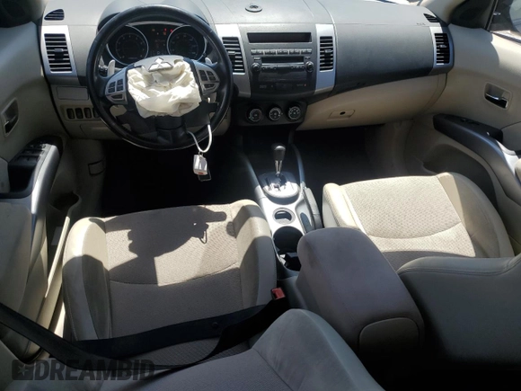 2010 Mitsubishi Outlander SE z VIN JA4AS3AW3AZ004523, wystawiony jako Copart lot #52864695 z przebiegiem 133 500 mil mil oraz Szkoda całkowita • Salvage title. Historia ofert i sprzedaży dostępna na DreamBid. Obrazek 8.