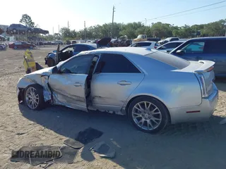 2011 Cadillac CTS Performance with VIN 1G6DJ5ED6B0128062, listed as a IAAI auction lot 42150038 with 245,293 mi miles and . Bid and sale history available at DreamBid. Image 14.