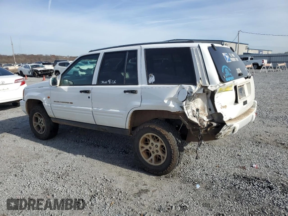 1996 Jeep Grand Cherokee Limited с VIN 1J4GZ78S2TY123592, выставлен на аукционе Copart как лот 84387624 с пробегом Не указан миль и Списание • Salvage title. История ставок и продаж доступна на DreamBid. Изображение 2.