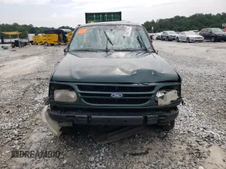 1998 Ford Explorer XLT with VIN 1FMZU32P8WZA91509, listed as a Copart auction lot 65531174 with 127,182 mi miles and Salvage title. Bid and sale history available at DreamBid. Image 5.