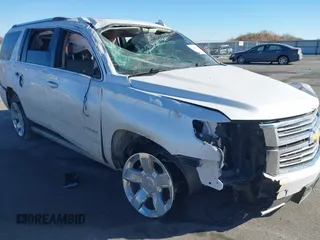 2016 Chevrolet Tahoe LTZ z VIN 1GNSKCKC0GR214110, wystawiony jako IAAI lot #41680822 z przebiegiem 60 271 mil mil oraz . Historia ofert i sprzedaży dostępna na DreamBid. Obrazek 1.
