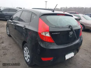 2013 Hyundai Accent GL with VIN KMHCT5AE4DU138789, listed as a IAAI auction lot 41536803 with 162,212 mi miles. Bid and sale history available at carsss.com. Image 3.