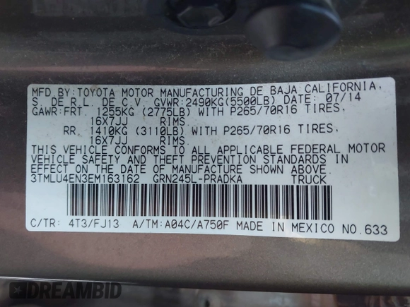 2014 Toyota Tacoma with VIN 3TMLU4EN3EM163162, listed as a IAAI auction lot 41930392 with 167,368 mi miles and . Bid and sale history available at DreamBid. Image 9.
