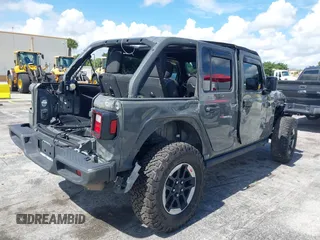 2019 Jeep Wrangler Unlimited Rubicon with VIN 1C4HJXFN9KW507281, listed as a IAAI auction lot 42695939 with 60,802 mi miles and . Bid and sale history available at DreamBid. Image 4.