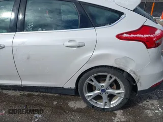 2015 Ford Focus Titanium с VIN 1FADP3N26FL232639, выставлен на аукционе IAAI как лот 41699403 с пробегом 86 870 миль миль и . История ставок и продаж доступна на DreamBid. Изображение 6.