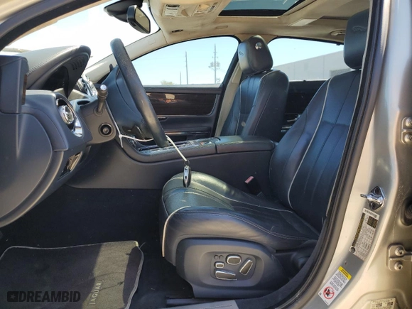 2012 Jaguar XJ with VIN SAJWA2GB2CLV30212, listed as a Copart auction lot 49218185 with 145,932 mi miles and Clean Title. Bid and sale history available at carsss.com. Image 7.
