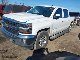 2016 Chevrolet Silverado 1500 LT with VIN 3GCUKREC1GG289513, listed as a IAAI auction lot 41407335 with 83,473 mi miles. Bid and sale history available at carsss.com. Image 2.