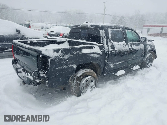 2018 Toyota Tacoma SR with VIN 3TMCZ5AN6JM182800, listed as a IAAI auction lot 41524950 with 63,838 mi miles and . Bid and sale history available at DreamBid. Image 4.