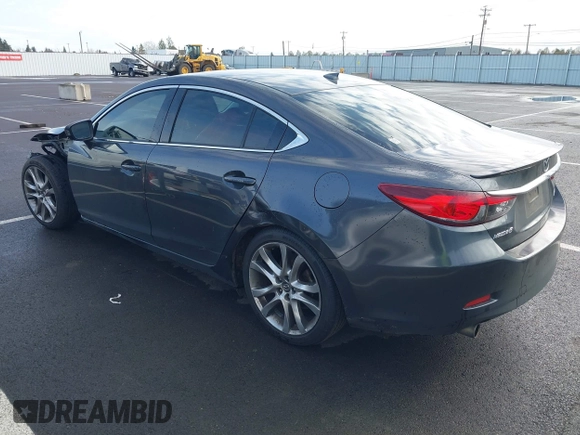 2014 Mazda 6 i Grand Touring with VIN JM1GJ1W63E1147380, listed as a IAAI auction lot 41928637 with 140,091 mi miles and . Bid and sale history available at DreamBid. Image 3.