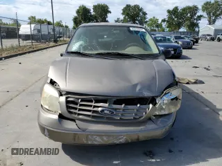 2005 Ford Freestar SE z VIN 2FMDA51635BA60614, wystawiony jako Copart lot #60058044 z przebiegiem 228 858 mil mil oraz Szkody całkowita. Historia ofert i sprzedaży dostępna na DreamBid. Obrazek 5.