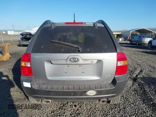 2006 Kia Sportage LX with VIN KNDJE723X67242610, listed as a IAAI auction lot 41735144 with 244,979 mi miles and . Bid and sale history available at DreamBid. Image 16.