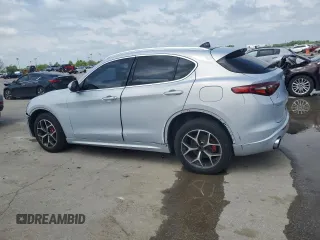 2021 Alfa Romeo Stelvio Ti z VIN ZASPAKBNXM7D03145, wystawiony jako Copart lot #54486365 z przebiegiem 34 139 mil mil oraz Szkoda całkowita • Salvage title. Historia ofert i sprzedaży dostępna na DreamBid. Obrazek 2.