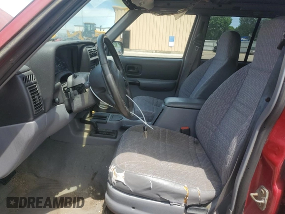 1998 Jeep Cherokee Sport with VIN 1J4FJ68S2WL285432, listed as a Copart auction lot 57183145 with 284,162 mi miles and Clean title. Bid and sale history available at DreamBid. Image 7.