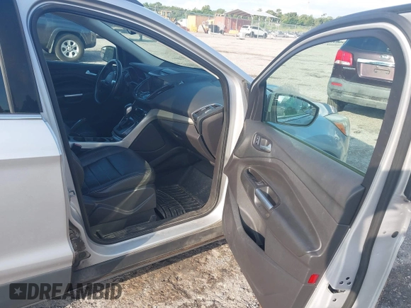 2013 Ford Escape SEL z VIN 1FMCU9HX8DUC26143, wystawiony jako IAAI lot #42815698 z przebiegiem 255 242 mil mil oraz . Historia ofert i sprzedaży dostępna na DreamBid. Obrazek 5.