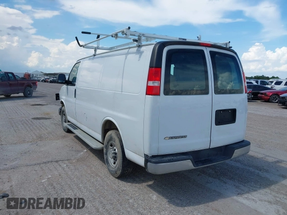 2021 Chevrolet Express Cargo with VIN 1GCWGAFP5M1258210, listed as a IAAI auction lot 42378121 with 50,438 mi miles and . Bid and sale history available at DreamBid. Image 3.