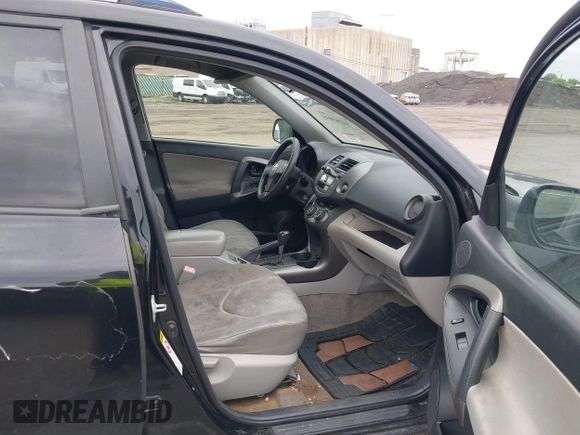 2009 Toyota RAV4 with VIN JTMZF33V995006183, listed as a IAAI auction lot 42265035 with 152,849 mi miles and . Bid and sale history available at DreamBid. Image 5.
