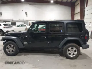 2019 Jeep Wrangler Unlimited Sport Altitude with VIN 1C4HJXDGXKW505396, listed as a IAAI auction lot 42039985 with 146,178 mi miles and . Bid and sale history available at DreamBid. Image 14.