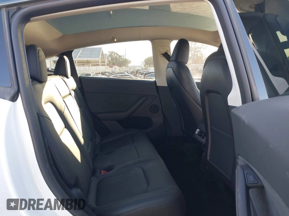 2023 Tesla Model Y Long Range with VIN 7SAYGDEE1PA128818, listed as a IAAI auction lot 41622062 with 19,089 mi miles. Bid and sale history available at carsss.com. Image 8.