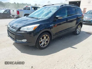 2013 Ford Escape SEL with VIN 1FMCU9HX5DUC90186, listed as a IAAI auction lot 42650691 with 151,009 mi miles and . Bid and sale history available at DreamBid. Image 2.