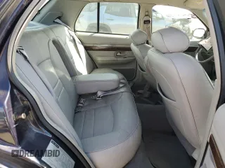 1999 Mercury Grand Marquis LS z VIN 2MEFM75W1XX635839, wystawiony jako Copart lot #55860735 z przebiegiem 114 963 mil mil oraz Szkody całkowita. Historia ofert i sprzedaży dostępna na DreamBid. Obrazek 10.
