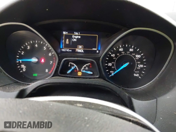 2015 Ford Focus SE with VIN 1FADP3F21FL270827, listed as a IAAI auction lot 42665015 with 162,745 mi miles and . Bid and sale history available at DreamBid. Image 7.