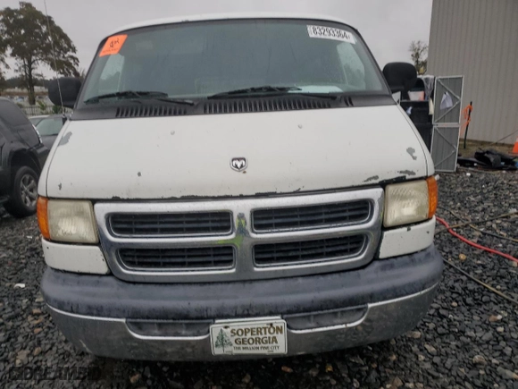 2000 Dodge Ram Wagon with VIN 2B5WB35ZXYK166395, listed as a Copart auction lot 83293364 with NaN miles and Salvage Title. Bid and sale history available at carsss.com. Image 5.