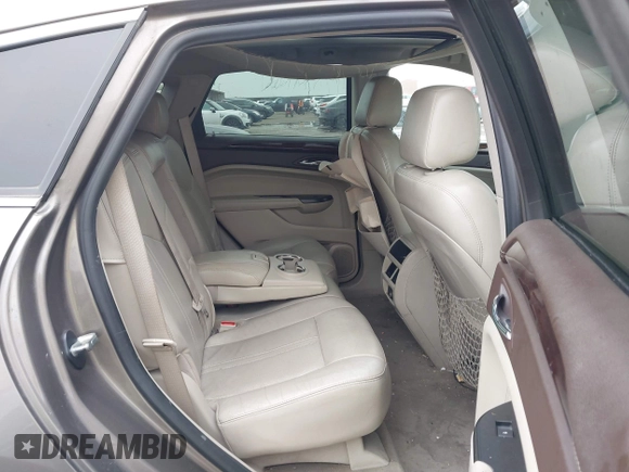 2012 Cadillac SRX Luxury Collection with VIN 3GYFNAE33CS587208, listed as a IAAI auction lot 42142976 with 218,380 mi miles and . Bid and sale history available at carsss.com. Image 8.