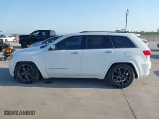2014 Jeep Grand Cherokee Overland with VIN 1C4RJFCG6EC579985, listed as a IAAI auction lot 42025215 with 126,761 mi miles. Bid and sale history available at carsss.com. Image 15.