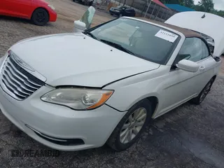 2012 Chrysler 200 Touring with VIN 1C3BCBEB1CN168649, listed as a IAAI auction lot 42111699 with 190,818 mi miles and . Bid and sale history available at DreamBid. Image 2.