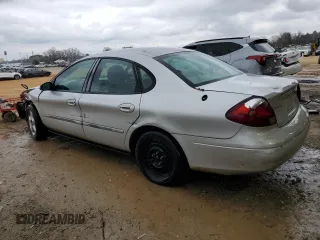 2000 Ford Taurus SE with VIN 1FAFP532XYA141783, listed as a Copart auction lot 43949795 with 203,939 mi miles and Salvage Title. Bid and sale history available at DreamBid. Image 2.