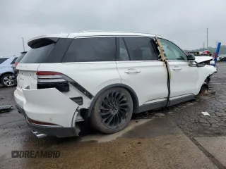 2020 Lincoln Aviator Reserve z VIN 5LM5J7XC6LGL29401, wystawiony jako Copart lot #59980655 z przebiegiem Nie podano mil oraz Szkoda całkowita • Salvage title. Historia ofert i sprzedaży dostępna na DreamBid. Obrazek 3.