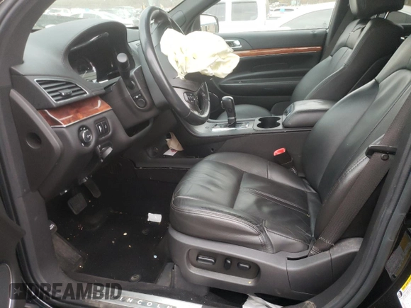 2019 Lincoln MKT with VIN 2LMHJ5NK3KBL04254, listed as a Copart auction lot 77127214 with Not Provided miles and Salvage Title. Bid and sale history available at DreamBid. Image 7.