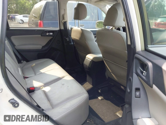 2015 Subaru Forester Touring with VIN JF2SJAWC9FH573973, listed as a IAAI auction lot 42380080 with 87,938 mi miles and . Bid and sale history available at DreamBid. Image 8.