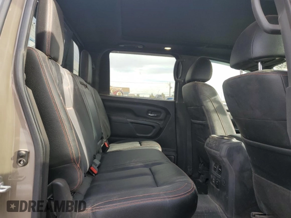 2024 Nissan Titan Pro-4X with VIN 1N6AA1ED3RN103011, listed as a Copart auction lot 87050954 with 8,829 mi miles and Salvage title. Bid and sale history available at DreamBid. Image 11.