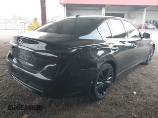 2019 Infiniti Q50 Luxe with VIN JN1EV7ARXKM593846, listed as a IAAI auction lot 42773548 with 57,165 mi miles and . Bid and sale history available at DreamBid. Image 4.