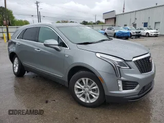 2023 Cadillac XT5 FWD Luxury z VIN 1GYKNAR47PZ144988, wystawiony jako Copart lot #50830365 z przebiegiem 17 687 mil mil oraz Szkody całkowita. Historia ofert i sprzedaży dostępna na DreamBid. Obrazek 4.
