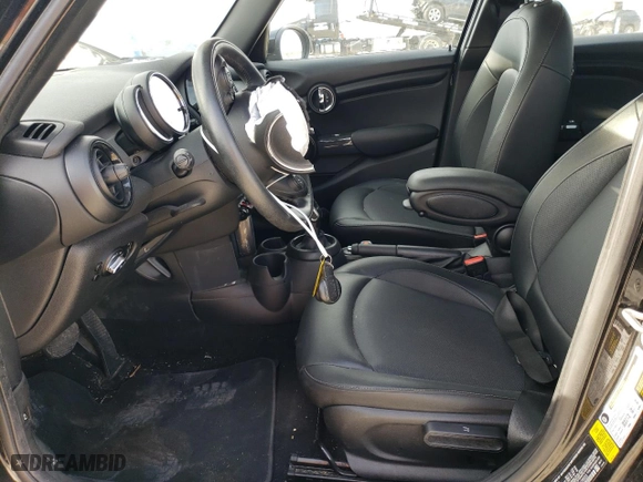 2021 MINI Hardtop 4 Door Oxford Edition with VIN WMWXU7C09M2N79553, listed as a Copart auction lot 84939724 with 59,139 mi miles and Salvage Title. Bid and sale history available at carsss.com. Image 7.