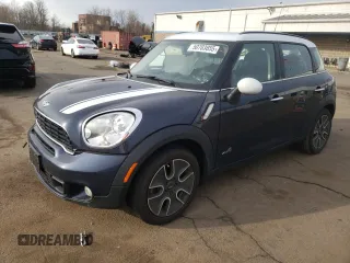 2012 MINI Countryman S with VIN WMWZC5C55CWL64092, listed as a Copart auction lot 50703855 with 69,785 mi miles and Salvage Title. Bid and sale history available at DreamBid. Image 1.