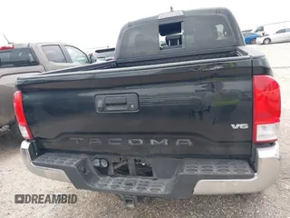 2017 Toyota Tacoma SR5 with VIN 5TFAZ5CN8HX052459, listed as a IAAI auction lot 41495281 with 212,314 mi miles and . Bid and sale history available at DreamBid. Image 16.