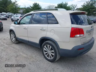 2011 Kia Sorento EX with VIN 5XYKUDA20BG031931, listed as a IAAI auction lot 42234673 with 171,221 mi miles and . Bid and sale history available at DreamBid. Image 3.
