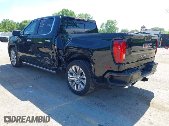 2021 GMC Sierra 1500 Denali with VIN 1GTU9FEL4MZ253708, listed as a IAAI auction lot 42209839 with 52,279 mi miles and . Bid and sale history available at DreamBid. Image 3.