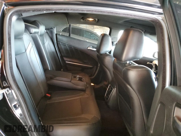 2015 Dodge Charger SXT with VIN 2C3CDXJG9FH748809, listed as a Copart auction lot 61682335 with 128,252 mi miles and Salvage title. Bid and sale history available at DreamBid. Image 10.