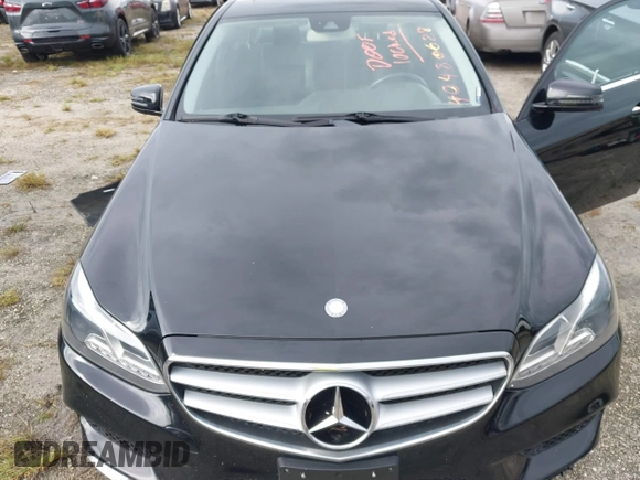 2014 Mercedes-Benz E 350 Luxury with VIN WDDHF8JB0EA907936, listed as a IAAI auction lot 40480628 with Not Provided miles and . Bid and sale history available at DreamBid. Image 6.
