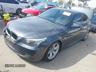2010 BMW 5 Series 528i with VIN WBANU5C52AC129868, listed as a IAAI auction lot 41765467 with 228,161 mi miles and . Bid and sale history available at carsss.com. Image 2.