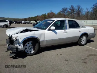 2005 Mercury Grand Marquis GS with VIN 2MEFM74W55X654070, listed as a Copart auction lot 53114785 with 56,128 mi miles and Salvage Title. Bid and sale history available at DreamBid. Image 1.