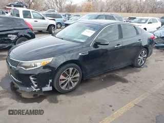 2016 Kia Optima SX Turbo with VIN 5XXGW4L2XGG052746, listed as a IAAI auction lot 41306792 with 69,571 mi miles and . Bid and sale history available at carsss.com. Image 17.