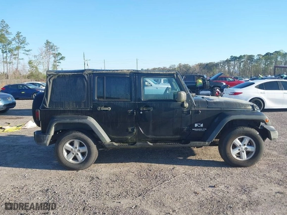 2007 Jeep Wrangler Unlimited X with VIN 1J4GA39127L159095, listed as a IAAI auction lot 41780974 with 179,791 mi miles. Bid and sale history available at carsss.com. Image 13.