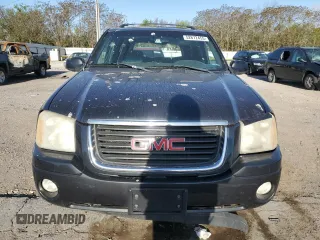 2004 GMC Envoy SLE with VIN 1GKDT13S042404250, listed as a Copart auction lot 52672455 with 230,610 mi miles and Salvage Title. Bid and sale history available at carsss.com. Image 5.