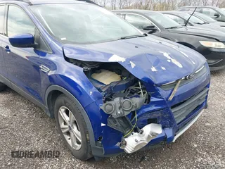 2016 Ford Escape SE z VIN 1FMCU9G99GUC32802, wystawiony jako IAAI lot #41958414 z przebiegiem 131 962 mil mil oraz . Historia ofert i sprzedaży dostępna na DreamBid. Obrazek 6.