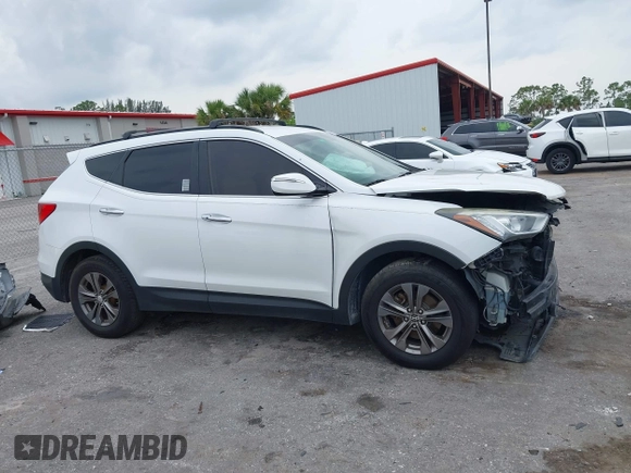2014 Hyundai Santa Fe with VIN 5XYZU3LB9EG229255, listed as a IAAI auction lot 42407410 with 201,523 mi miles and . Bid and sale history available at DreamBid. Image 14.